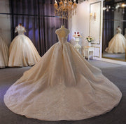 Dramatic Glitter Ballgown Wedding Gown with Layers of Tulle and Dramatic Train